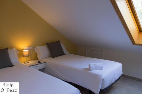 Ένα ή περισσότερα κρεβάτια σε δωμάτιο στο Hotel O'Pazo