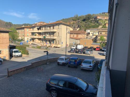 a view of a street with cars parked in a parking lot at SMartspot Rosia in Rosia