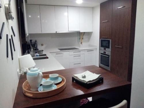 Dapur atau dapur kecil di Luxury 3 Bedroom Penthouse With Private Garage