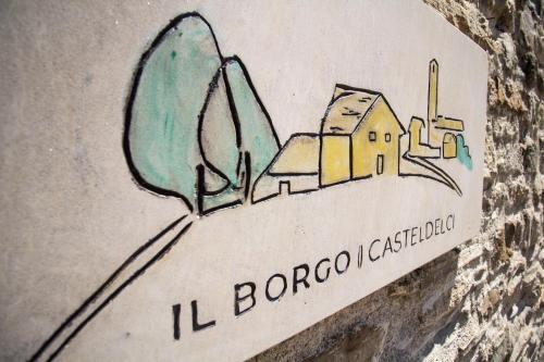 Un certificado, premio, letrero u otro documento en Il borgo Casteldelci
