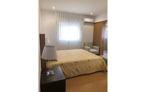 Ένα ή περισσότερα κρεβάτια σε δωμάτιο στο Casa do Meio