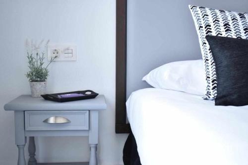 Posteľ alebo postele v izbe v ubytovaní Holyhome grey 217