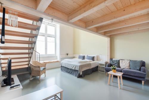 Postel nebo postele na pokoji v ubytování Vorgarten Apartments - central, new and stylish for your comfortable stay in Vienna