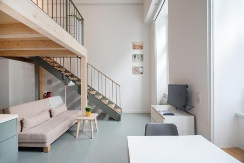 Posezení v ubytování Vorgarten Apartments - central, new and stylish for your comfortable stay in Vienna