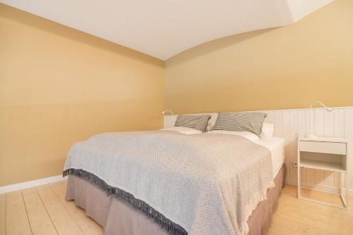 Postel nebo postele na pokoji v ubytování Vorgarten Apartments - central, new and stylish for your comfortable stay in Vienna