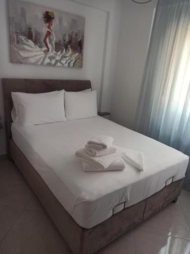 Ένα ή περισσότερα κρεβάτια σε δωμάτιο στο Cyclops Luxury Apartments