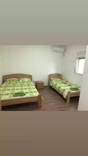 Krevet ili kreveti u jedinici u okviru objekta Smestaj sobe di camera uno
