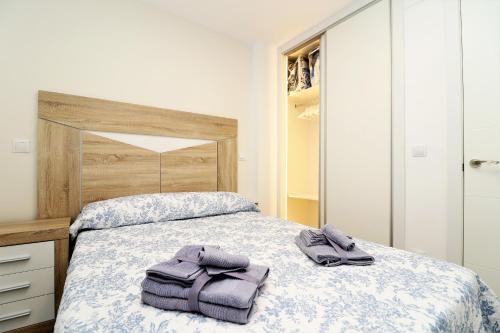 Llit o llits en una habitació de Ducado 1-C Apartment Levante Beach