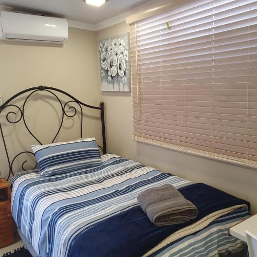 Katil atau katil-katil dalam bilik di KOL-IN SELF CATERING
