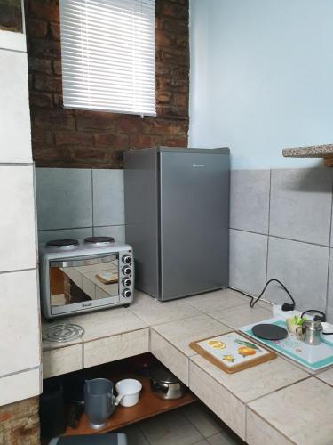 Dapur atau dapur kecil di KOL-IN SELF CATERING