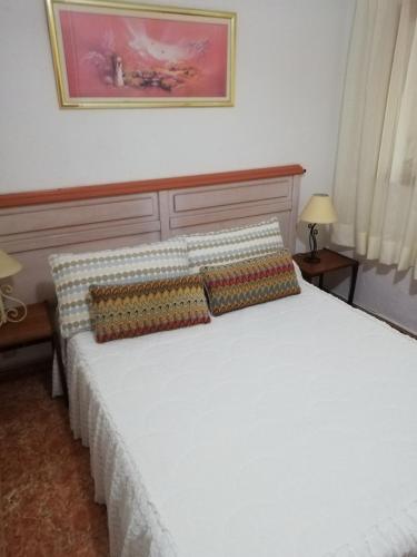 Postel nebo postele na pokoji v ubytování Casa Mari Carmen y Jose