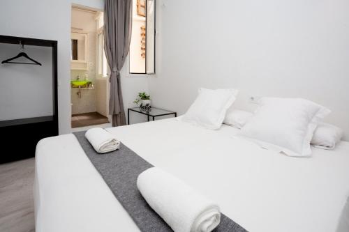 Ένα ή περισσότερα κρεβάτια σε δωμάτιο στο Easy Sants by Bossh! Hotels