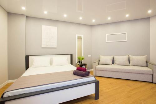 Ένα ή περισσότερα κρεβάτια σε δωμάτιο στο Studio near metro Yaroslava Mudroho, Universytet - Mykoly Khvylovoho str 5-3