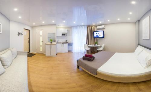 Ένα ή περισσότερα κρεβάτια σε δωμάτιο στο Studio near metro Yaroslava Mudroho, Universytet - Mykoly Khvylovoho str 5-3