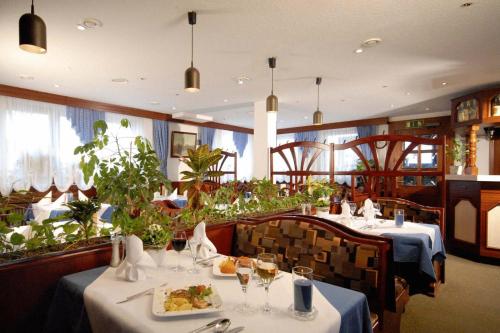 Imagen de la galería de Hotel & Restaurant Hugenottengarten, en Friedrichsdorf