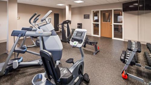 a gym with exercise bikes and a treadmill at Best Western Plus Flathead Lake Inn and Suites in Kalispell