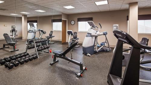 a gym with treadmills and cardio equipment in a room at Best Western Plus Flathead Lake Inn and Suites in Kalispell