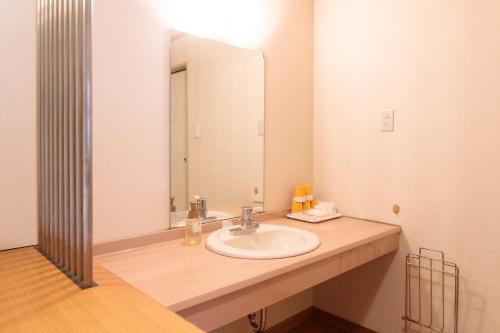 A bathroom at Okido Hotel