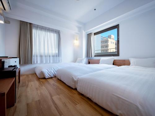 Cama o camas de una habitación en EN HOTEL Kyoto