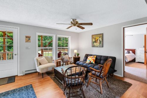 a living room with a couch and chairs at Chandler Hill Base Camp - Enjoy A Nature Getaway in this Rustic Home in the Mountains, 10 minutes from Sunday River Ski Mountain! home in Bethel