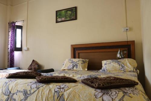 Postel nebo postele na pokoji v ubytování Mother Hostel