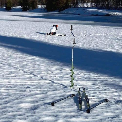 a reflection of a skier in the snow at In the middle of Trysilfjellet - Welcome Center - Apartment with 3 bedrooms - By bike arena and ski lift in Trysil