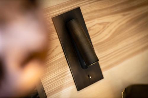 a close up of a speaker on a wooden table at Atmospheres in Le Bourget-du-Lac
