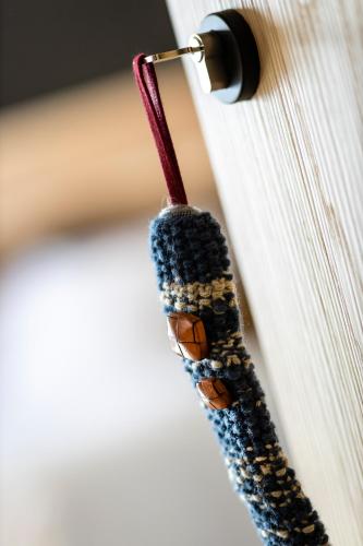 a red thread sticking out of a book at Atmospheres in Le Bourget-du-Lac