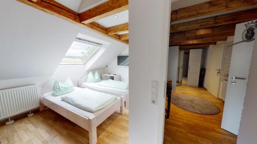 Ein Bett oder Betten in einem Zimmer der Unterkunft Pension Weinsberger Tal