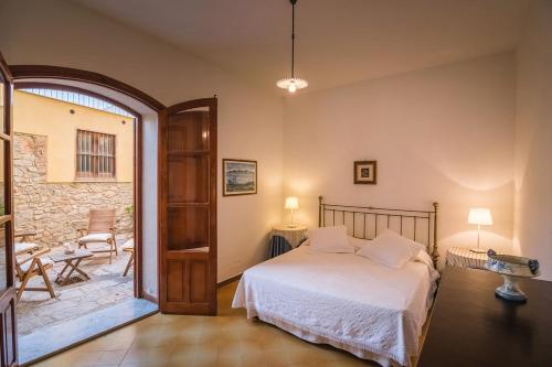 Кровать или кровати в номере Casa al Bragone