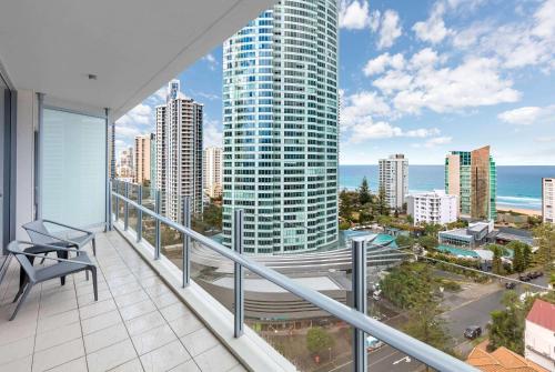 an apartment balcony with a view of a city at Wyndham Resort Surfers Paradise in Gold Coast