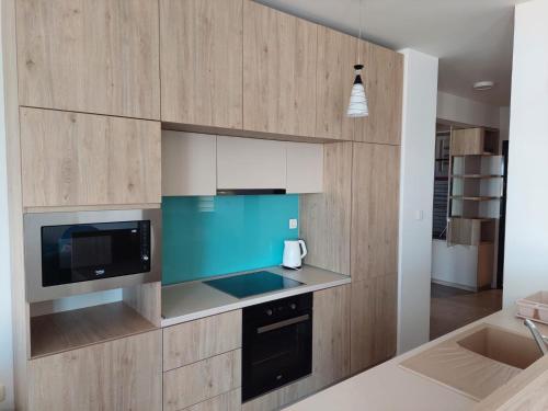 Dapur atau dapur kecil di Riverside Apartments