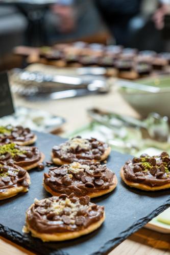 a tray of chocolate covered donuts on a table at Hotel Saint Sophia in Istanbul