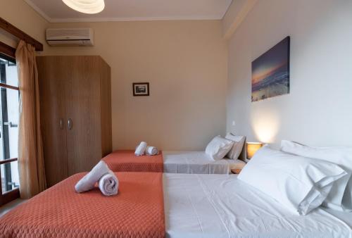 Ένα ή περισσότερα κρεβάτια σε δωμάτιο στο Balis Apartments
