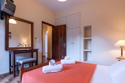 Ένα ή περισσότερα κρεβάτια σε δωμάτιο στο Balis Apartments