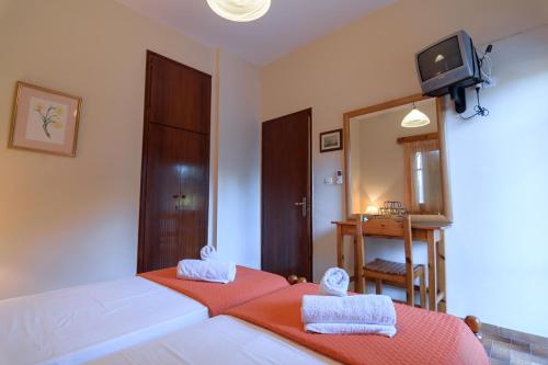 Ένα ή περισσότερα κρεβάτια σε δωμάτιο στο Balis Apartments