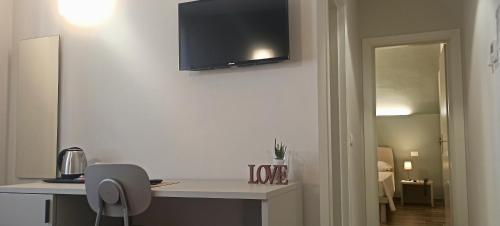 A television and/or entertainment centre at Hotel Cavallo Bianco