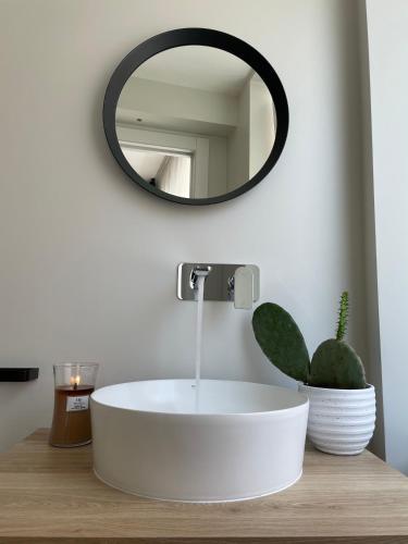 Un baño de Vento Suites