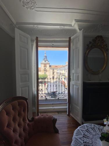 an open door with a view of a building at Palacete Plaza Mayor in El Burgo de Osma