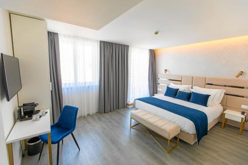 Postel nebo postele na pokoji v ubytování Hotel Mondego