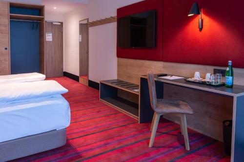 Postel nebo postele na pokoji v ubytování Kb Hotel