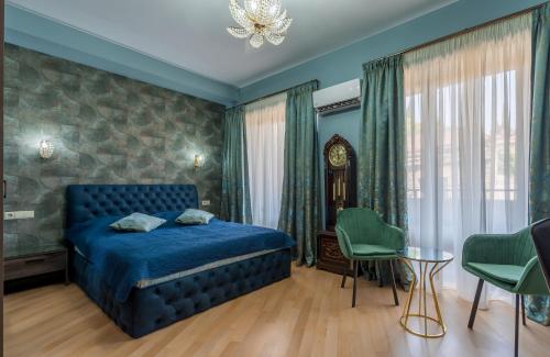 Postel nebo postele na pokoji v ubytování Constant Tbilisi