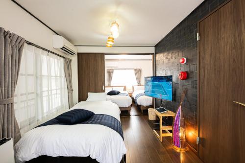 Una cama o camas en una habitación de Vacation Rental NISHIDA - Vacation STAY 61687v