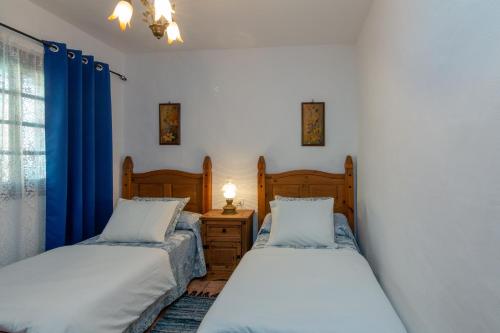 Postel nebo postele na pokoji v ubytování Casa Cucú