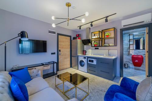 Η κουζίνα ή μικρή κουζίνα στο Aria Riva Apart Hotel