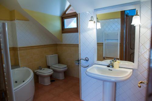 Ett badrum på Apartamentos Torre Cristina