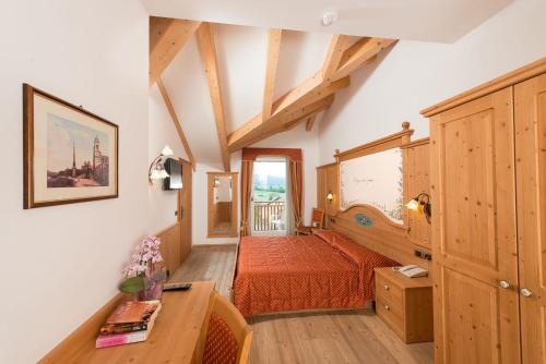 Postel nebo postele na pokoji v ubytování Lady Maria Hotel Wellness & Resort