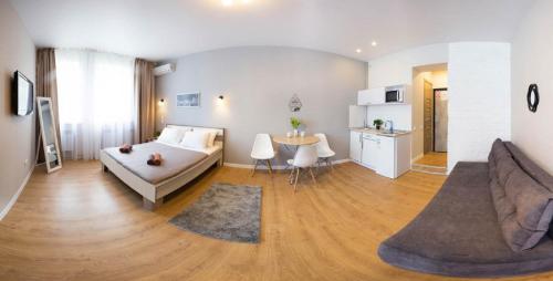 Χώρος καθιστικού στο Modern studio beside metro Yaroslava Mudroho, Universytet - Chernyshevska str 95-7