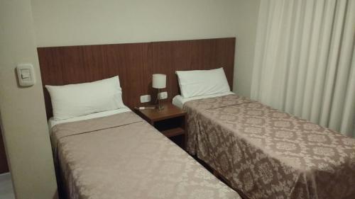 Una cama o camas en una habitación de 11 Peyret Rent Aparts