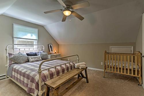 a bedroom with a bed and a ceiling fan at Deck and Gas Grill Modern East Stroudsburg Home! in East Stroudsburg